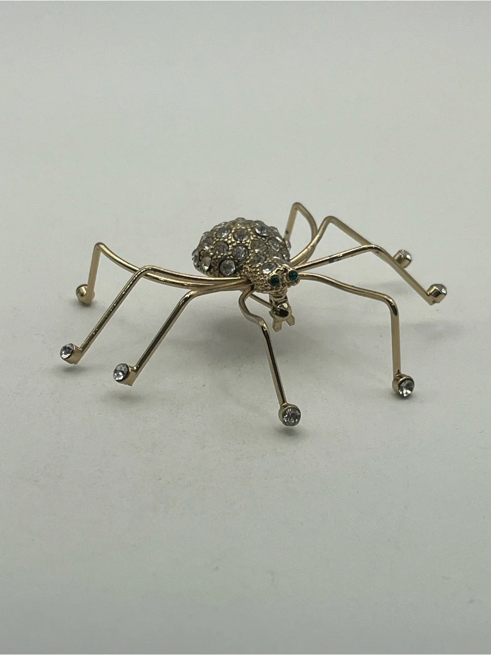 Spider insect gold tone clear rhinestone brooch pin